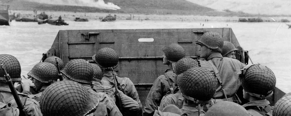 Picture of Soldiers in Landing craft looking towards shore as they approach Omaha Beach
